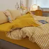 Juego de cuatro piezas de algodón lavado a cuadros, sábana y funda de edredón de estilo ins simple, juego de ropa de cama de tres piezas para cama individual de dormitorio estudiantil