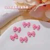 Joyería para Uñas con Lazo Rosa Popular en Internet Aleación Metálica Cruz Amor Pajarita Decoración para Uñas Accesorios