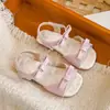 Zapatos de Playa Antideslizantes Verano 2026 Nuevas Sandalias Florales para Niñas Pequeñas Zapatos de Princesa para Niños con Suelas Suaves y Lazo