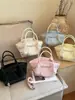 Bolso de mano tipo cubo de diseño de moda transfronterizo para mujer, nuevo diseño coreano de nicho, bolso de hombro y bandolera para el día a día