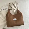 Bolsa de Axila Estilo Ins da Moda Outono 2025 Nova Simples de Alto Valor Bolsa Vermelha de Pelúcia Nicho Manual Feminina