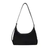 Bolso de moda de diseño nicho transfronterizo tipo bolsa de dumplings 2026 invierno nuevo elegante moderno versión coreana ins chic bolso de un solo hombro