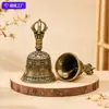 Popular campana de latón estilo Tíbet con monedas de los Cinco Emperadores, campana de la paz, accesorio antiguo creativo, campana de mano Vajra, venta al por mayor