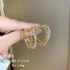 Exquisitos pendientes largos cortos con borlas incrustados de perlas y diamantes para mujer diseño de nicho de lujo ligero pendientes de lazo amor