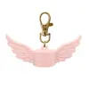 Llavero Personalizado con Logo Transfronterizo, Cubierta de Silicona con Forma de Ala para Tapa de Labial/Brillo de Labios, Tapa de Bálsamo Labial con Clip de Grado Alimenticio