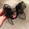 Accesorios para el cabello no metálicos 2026 moda de tendencia gasa de seda lazo de lunares gomas para el pelo cintas para coleta tocado versátil