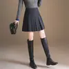 Saia plissada xadrez da moda para mulheres, novo estilo outono e inverno de 2026, cintura elástica, saia curta em linha A que afina, versátil e casual