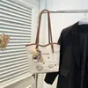 Bolsa de Praia para Férias na Beira-Mar Feminina 2025 Nova de Verão Bolsa de Ombro Trançada Grande Capacidade Bolsa Tote de Palha de Axila
