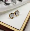 Aretes transfronterizos que no se decoloran, aretes de botón simples para mujer, aretes de oro de 18k minimalistas de lujo ligero, aretes de botón de acero de titanio de nicho, joyería