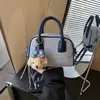 Bolsa de Ombro Cruzada Exquisita Popular de Verão para o Trabalho Feminina 2026 Novo Estilo Tendência Super Quente Essenciais de Trabalho Pequena Bolsa Tote