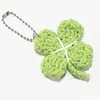 Nuevo Colgante de Bolso de Trébol de Cuatro Hojas Dulce Colgante Tejido Hecho a Mano de Flor Linda Creativa Transfronterizo de Amazon Todo-fósforo