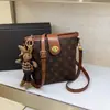 Bolso Cubo Texturizado de Alta Calidad Transfronterizo para Mujer, Bolso Cruzado Versátil Casual de Nicho Retro Europeo y Americano, Bolso de Viaje, Bolso de Hombro