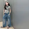 Conjunto de Verano para Niñas 2026 Nuevo Casual Estilo Coreano para Niñas Mayores Pantalones Vaqueros Cropped de Manga Corta Color Block