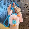 Llavero Colgante de Niña Caricaturesca Moderna Genial con Cabello Rizado, Muñeca Sabor Leche, Decoración para Bolso Femenino, Llavero de Regalo Pequeño