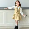 Conjunto de Outono Rantuo para Meninas 2026 Novo Doce Colorido Múltiplas Cores Conjunto de Três Peças Colete Camisa Saia Transfronteiriço