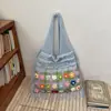 Bolso tejido de estilo casual transfronterizo para mujer, nuevo modelo 2026, bolso de hombro color block para vacaciones, bolsa de mano de gran capacidad para el día a día