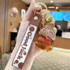 Chaveiro Copo de Chá com Leite Iceberg Colorido Transfronteiriço Pingente de Bolsa para Casal Anel de Chaveiro Exquisito com Areia Movediça Líquida