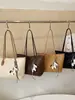 Bolsa de Hombro Retro Simple de Nuevo Estilo Transfronteriza 2026 para Mujer, Bolso Tote, Bolso de Mano, Bolsa Grande de Capacidad para Viajes Diarios