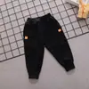 Calça infantil primavera e outono versão esportiva para bebê de 1 a 5 anos jeans de puxar calça masculina calça feminina uma geração de maré de cabelo