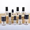 Los fabricantes de botellas de esmalte de uñas de vidrio transparente suministran tapas de botella con cepillo, botellas de esmalte de uñas transparentes de 5 ml a 15 ml al por mayor.