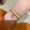 Amor Lazo Pequeño Deslizante Pollito Pequeño Croix Cruz Negro Oro Pulsera Francesa Vintage Oro Tejido Pulsera de Cuerda Roja para Mujeres