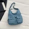 Mochila de mezclilla casual de alta calidad de Dongdaemun, Corea, nuevo modelo 2026, bolso de hombro versátil y elegante para el trabajo