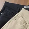 Pantalones casuales rectos ajustados versátiles de color otoño para hombre, suaves, elásticos, de sarga, estilo americano de cinco bolsillos, para negocios