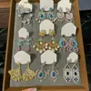 Pendientes de Perla de Diamante de Aguja Plateada Super Brillantes Europeos y Americanos Diseño de Nicho Pendientes Exquisitos Lujo Accesible Pendientes Elegantes de Gama Alta