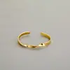 Pulsera de estilo frío simple diseño de nicho femenino temperamento de ola latón de 18K galvanizado oro real ajustable