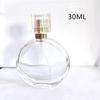 Botella de perfume de vidrio transparente de alto valor 50 ml cosmético aceite esencial spray sub-botella botella de muestra pequeña de perfume vacía