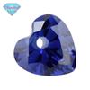 Huagang gem meio único furo em forma de coração Tan sang zircão azul pedra nua atacado artificial sintético Tan Sang Lan gem