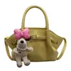 Bolsa Balde Plissada Portátil de Nicho de Luxo Feminina Moda Coreana Primavera 2025 Versátil para Ombro e Transversal