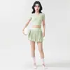 Conjunto de top de yoga de malla corto que revela la cintura y falda deportiva plisada, adelgazante y transpirable, conjunto de dos piezas para fitness y tenis