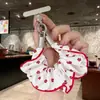 Alça de celular em tecido estilo doce e feminino com enfeites de strass, design criativo, atacado para chaveiros e pingentes de bolsa