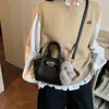 Bolso de Mano Estilo Coreano para Mujer 2026 Nuevo de Moda Tendencia Patrón de Lichi Bolso Cubo Versátil Bolso de Hombro Cruzado