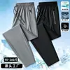 Pantalones de verano transpirables de secado rápido para hombre de talla grande, pantalones elásticos de seda helada, frescos y transpirables, elásticos, holgados y casuales para exportación