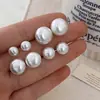 Brincos de Pérola Tipo Pão Chinês Retro Francês Design de Nicho para Mulheres Sentido de Design Luxo Leve de Ponta Ornamentos de Orelha Exagerados Brincos Simples para o Dia a Dia