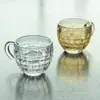 Taza de té resistente al calor directa de fábrica Vidrio europeo para restaurante Chapado iónico Patrón de bambú ámbar Taza de café