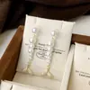 Pendientes de Borla Larga con Perlas Brillantes Estilo Cola de Pez de Lujo Ligero Francés de Gama Alta Elegantes y Versátiles para el Trabajo