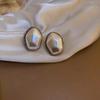 Pendientes retro de perlas francesas diseño femenino pendientes temperamento socialité 2025 nueva tendencia pendientes explosión venta al por mayor