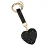 Llavero de Corazón de Diamante Completo de Venta Caliente Cross Colgante de Bolso de Corazón de Melocotón con Pedrería Llavero de Coche Personalidad de Moda Colgante
