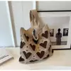 Nuevos bolsos de moda de celebridades de Internet para mujer, bolso de cubo de lana tejida, bolso de mano casual, bolsa para el almuerzo, venta al por mayor