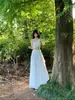 Vestido Francés de Nicho de Alta Calidad Blanco Frío Desenfadado para Mujer Ambiente de Vacaciones en la Playa Vestido Súper de Hada