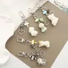 [Estilo Mascota Linda] Hueso de Perro Flocado Lindo Colgante para Funda de Teléfono Celular Decoración de Cámara Polaroid Ccd Gratis I