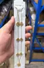 Collar de acero de titanio que no se decolora con 7 flores y trébol de cuatro hojas, cadena para la clavícula, acero de titanio con incrustación de concha 18k, collar moderno y versátil