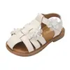 Sandalias de Verano para Niñas 2026 Nuevo Estilo Niña Pequeña Blancas Caladas Suela Suave Punta Cerrada Zapatos de Playa Princesa Venta al por Mayor