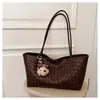Bolsa de Palha Tecida Retrô Feminina 2026 Nova Tendência Grande Capacidade Bolsa de Mão de Couro Macio Versátil para o Trabalho Bolsa de Ombro Bolsa de Braço