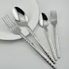Juego Creativo de Acero Inoxidable para Bistec Cuchillo Tenedor Cuchara Cuatro Piezas Juego de Vajilla de Hotel de Alta Calidad Antideslizante Restaurante Occidental Vajilla de Boda