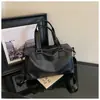 Bolsa de Hombro Individual de Gran Capacidad para Comercio Exterior para Mujer 2026 Nuevo Otoño Invierno Versátil Bolsa Tote Simple para el Trabajo Manual Cruzada