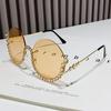 Gafas de sol de media montura redondas con incrustaciones de diamantes de metal europeos y americanos, gafas de sol de alta calidad transfronterizas de moda para mujer